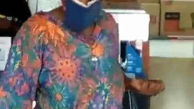 Woman Uses Bible As Face Mask - Watch Video Below