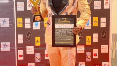 stanbelove with his award and certificate at the just ended Ghana Merit Awards 21