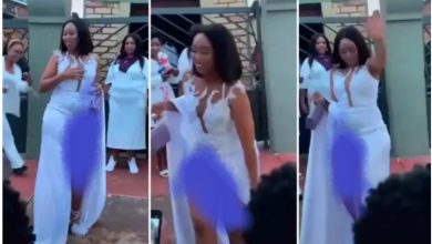 Bootylicious-Lady-With-High-Slit-Dress-Finds-it-Hard-To-Cover-Herself-Video